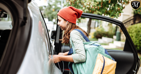 Teen girl getting into car